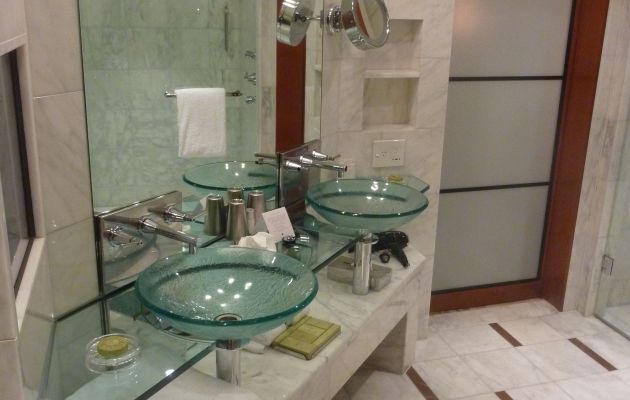 His and hers sinks and a makeup/shaving mirror for couples